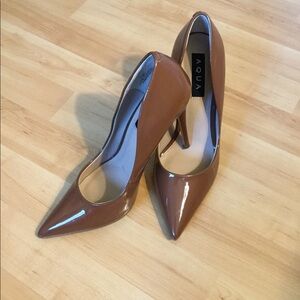 Aqua Brown patent pumps once worn